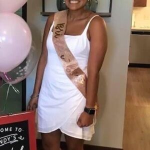 Small white dress worn for bridal shower